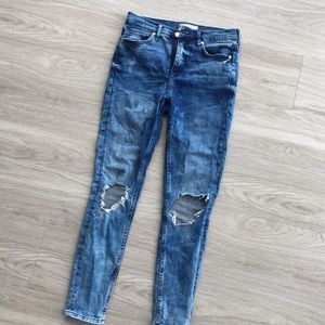 FREE PEOPLE busted knee skinny jeans